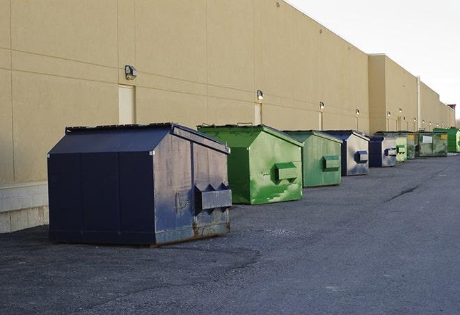 a row of industrial dumpsters for construction waste in Bellwood, IL